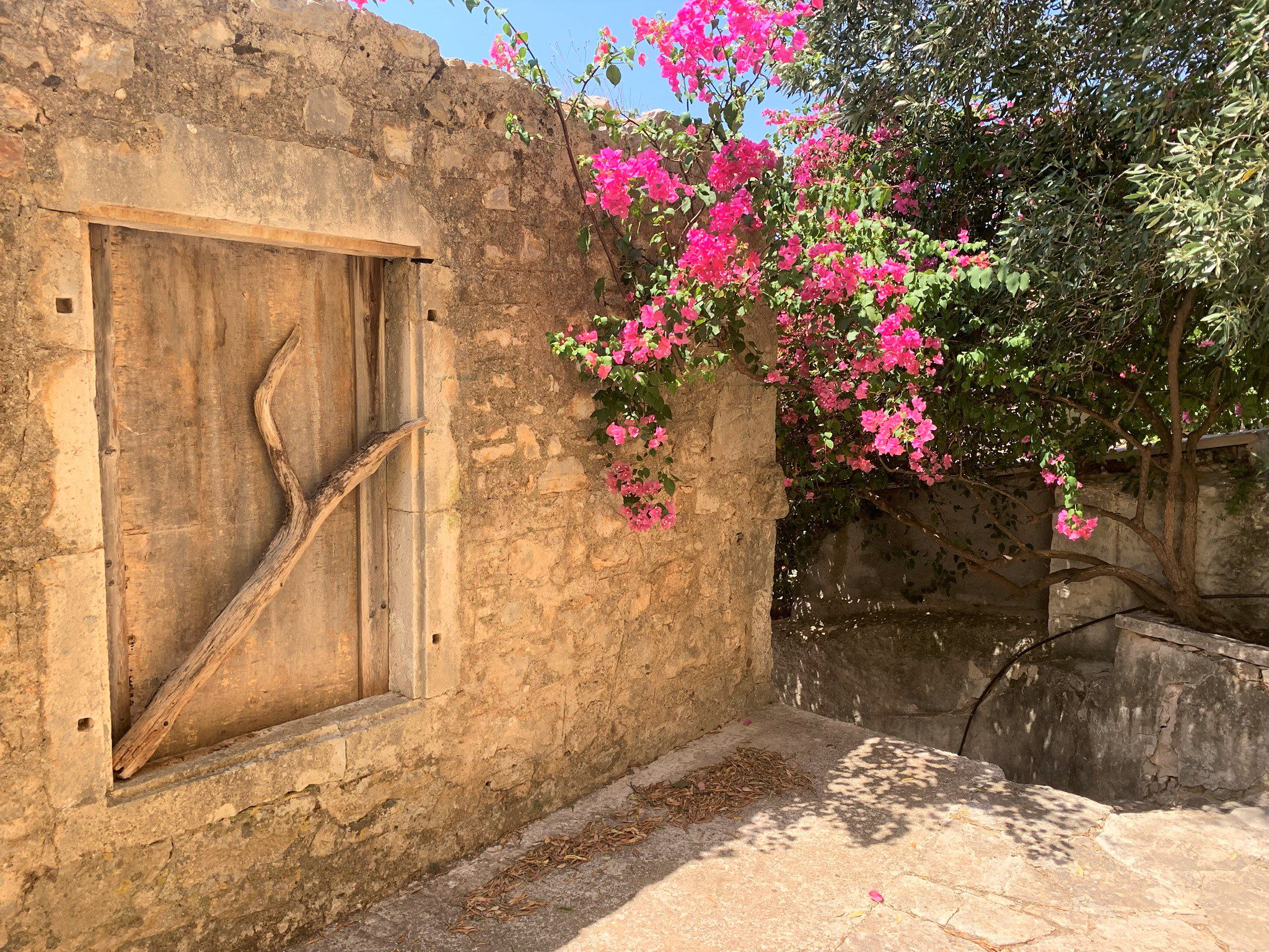 Exterior facade and terrace of ruin for sale in Ithaca Greece, Vathi