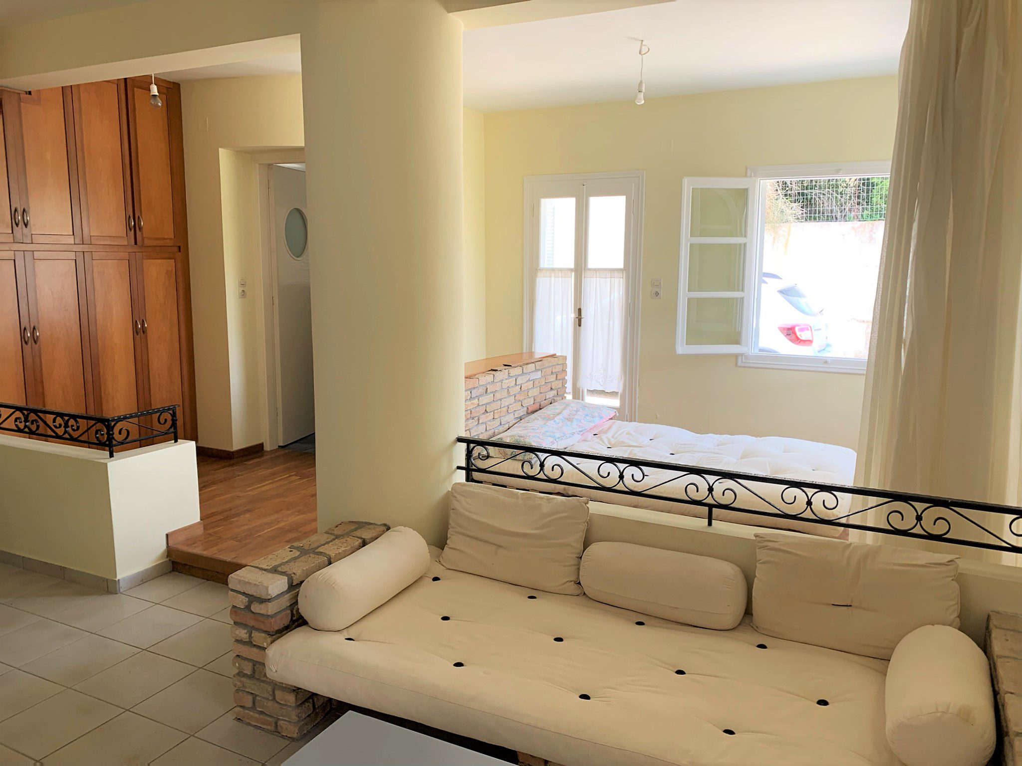 Living room of studio below house for sale Ithaca Greece, Aetos