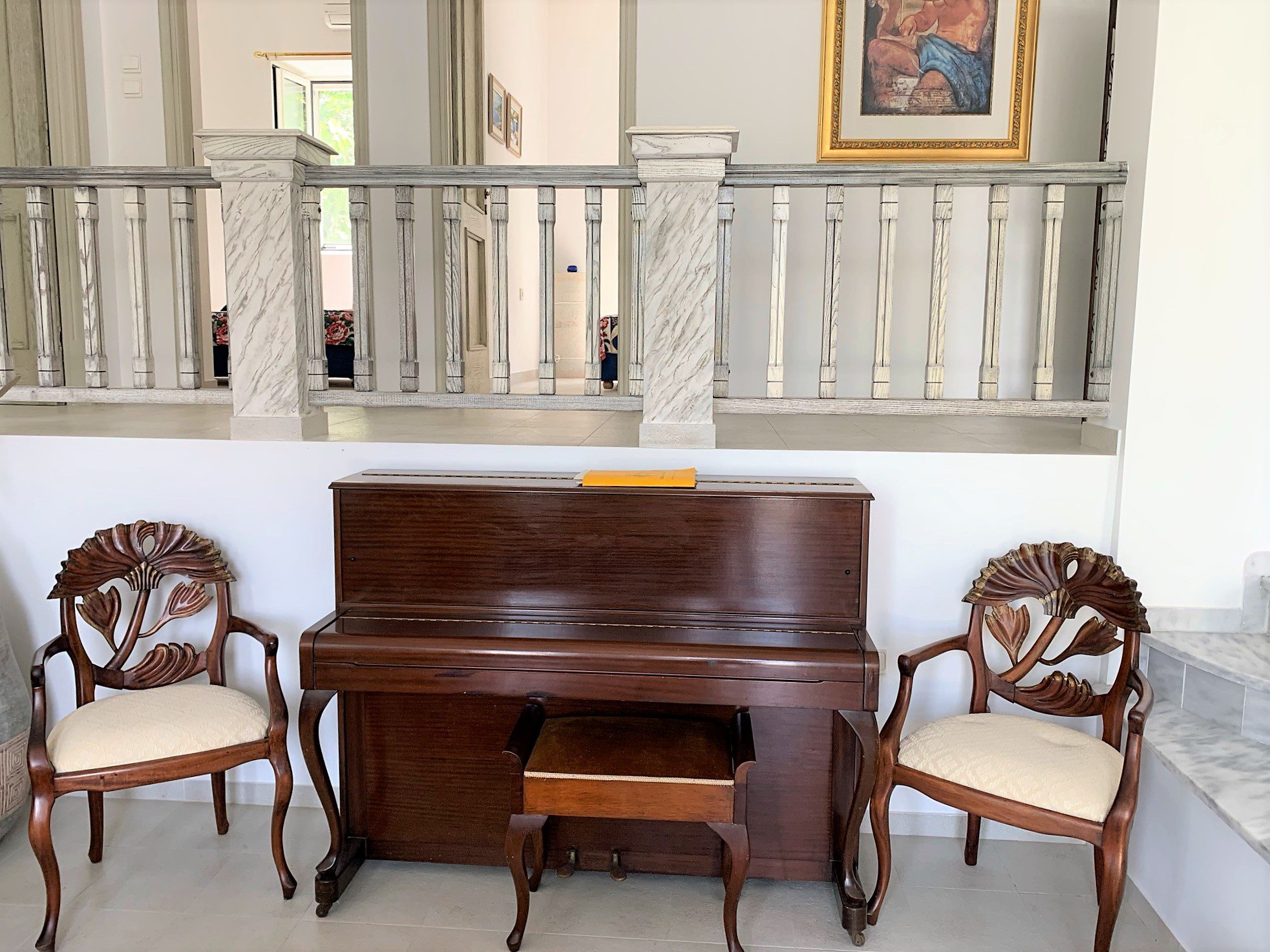 Living room with a piano of house for sale Ithaca Greece, Aetos