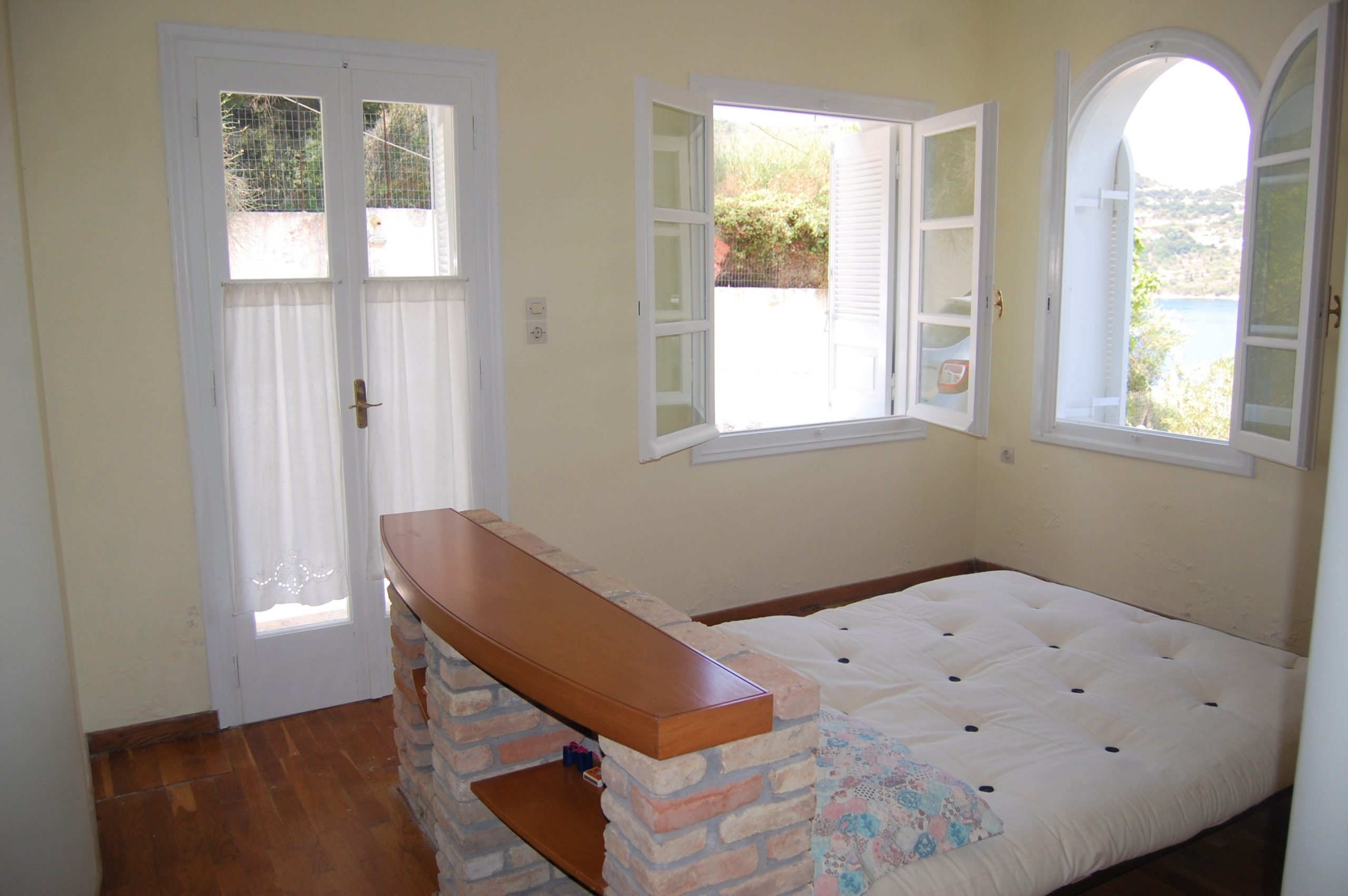 Bedroom of studio below house for sale Ithaca Greece, Aetos