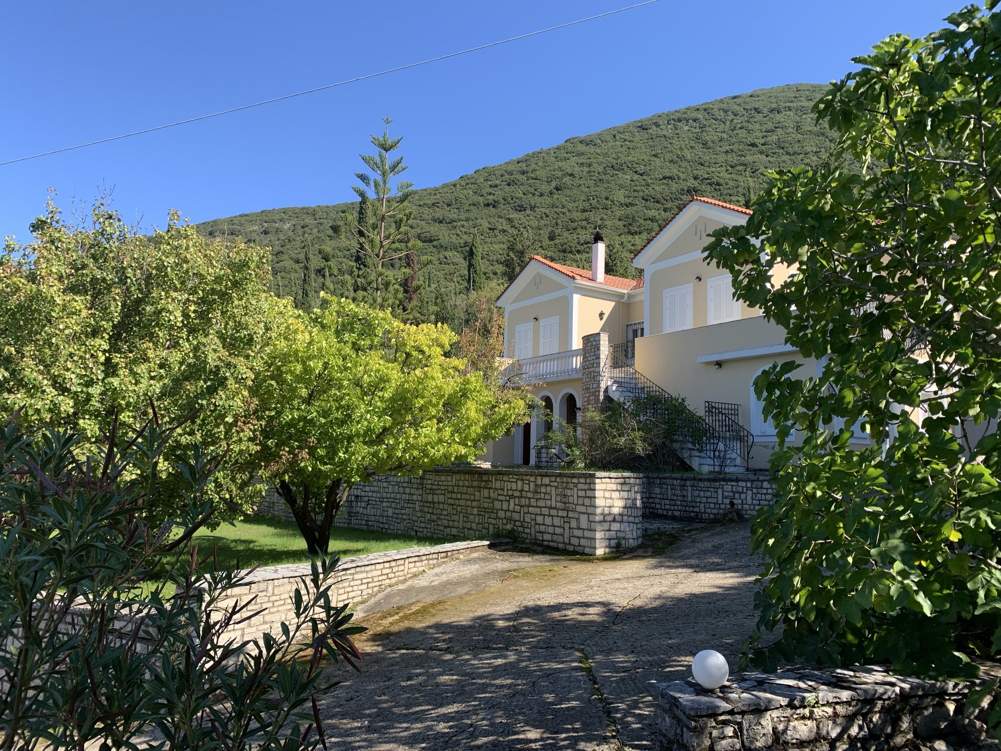 View from distance of house for sale Ithaca Greece, Aetos