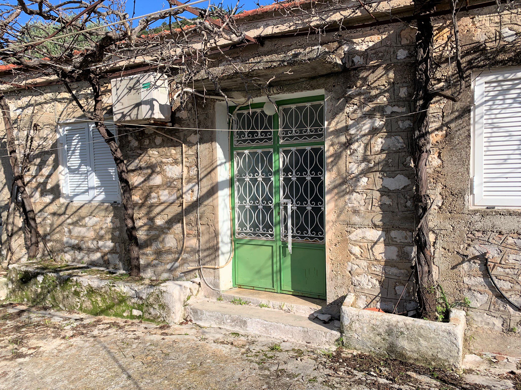 Exterior of house for sale on Ithaca Greece, Vathi