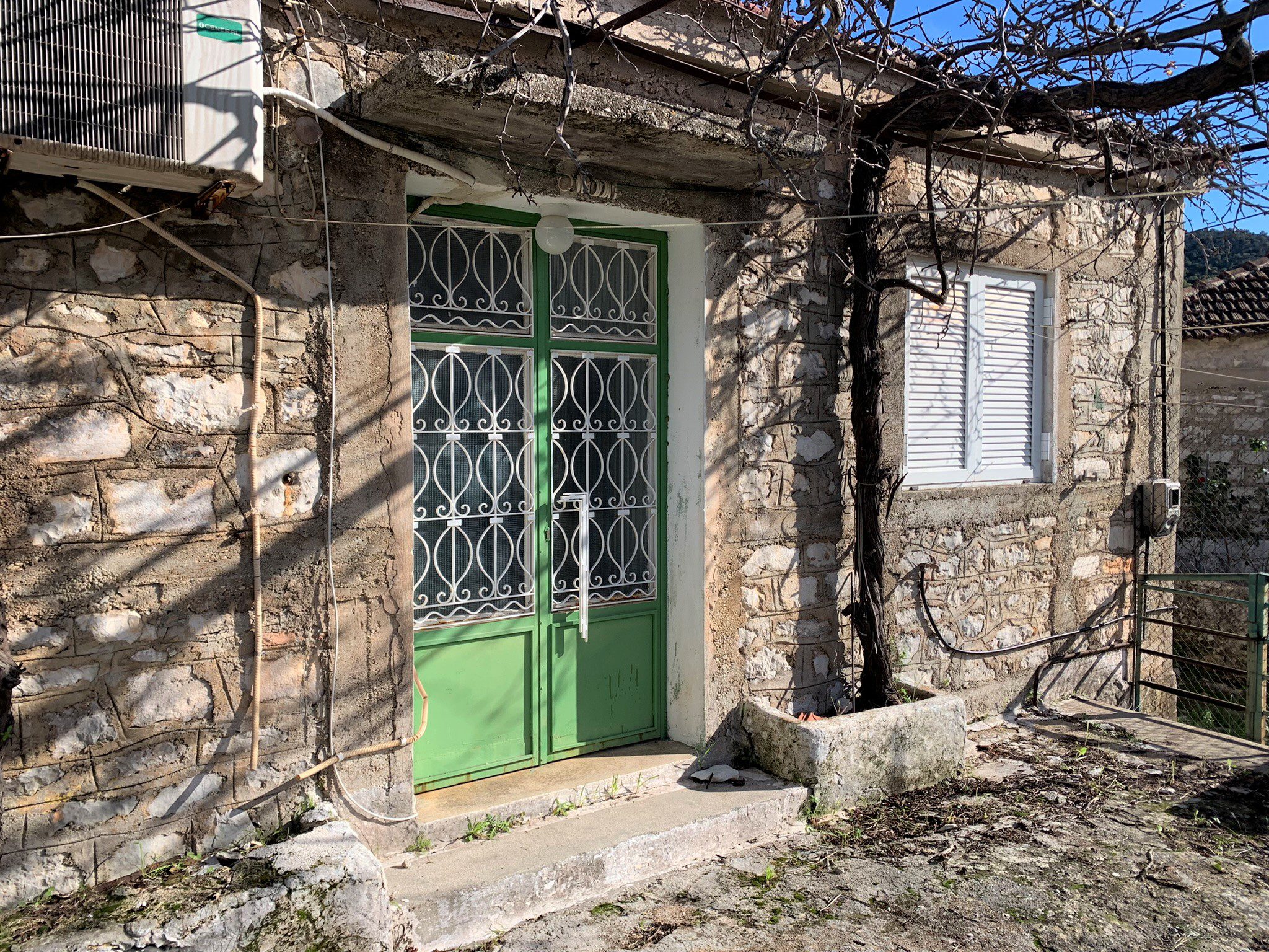 Exterior of house for sale on Ithaca Greece, Vathi