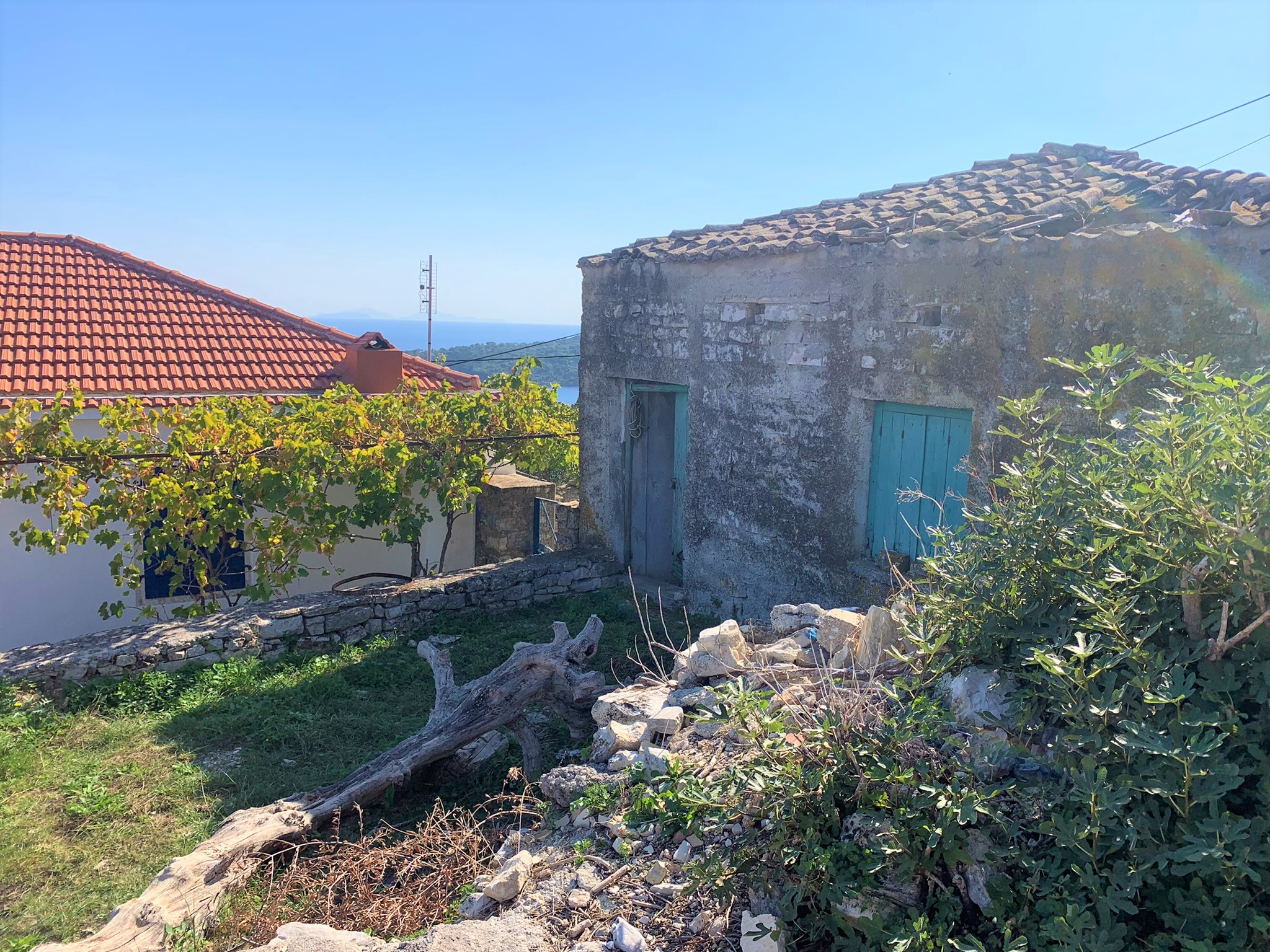Exterior of house for sale on Ithaca Greece, Kioni