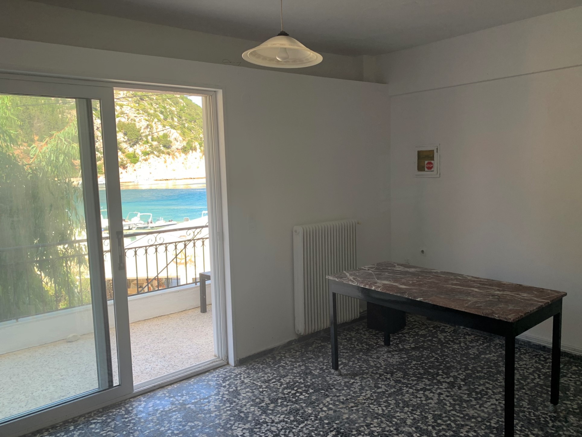 Living room of house for sale in Ithaca Greece, Frikes