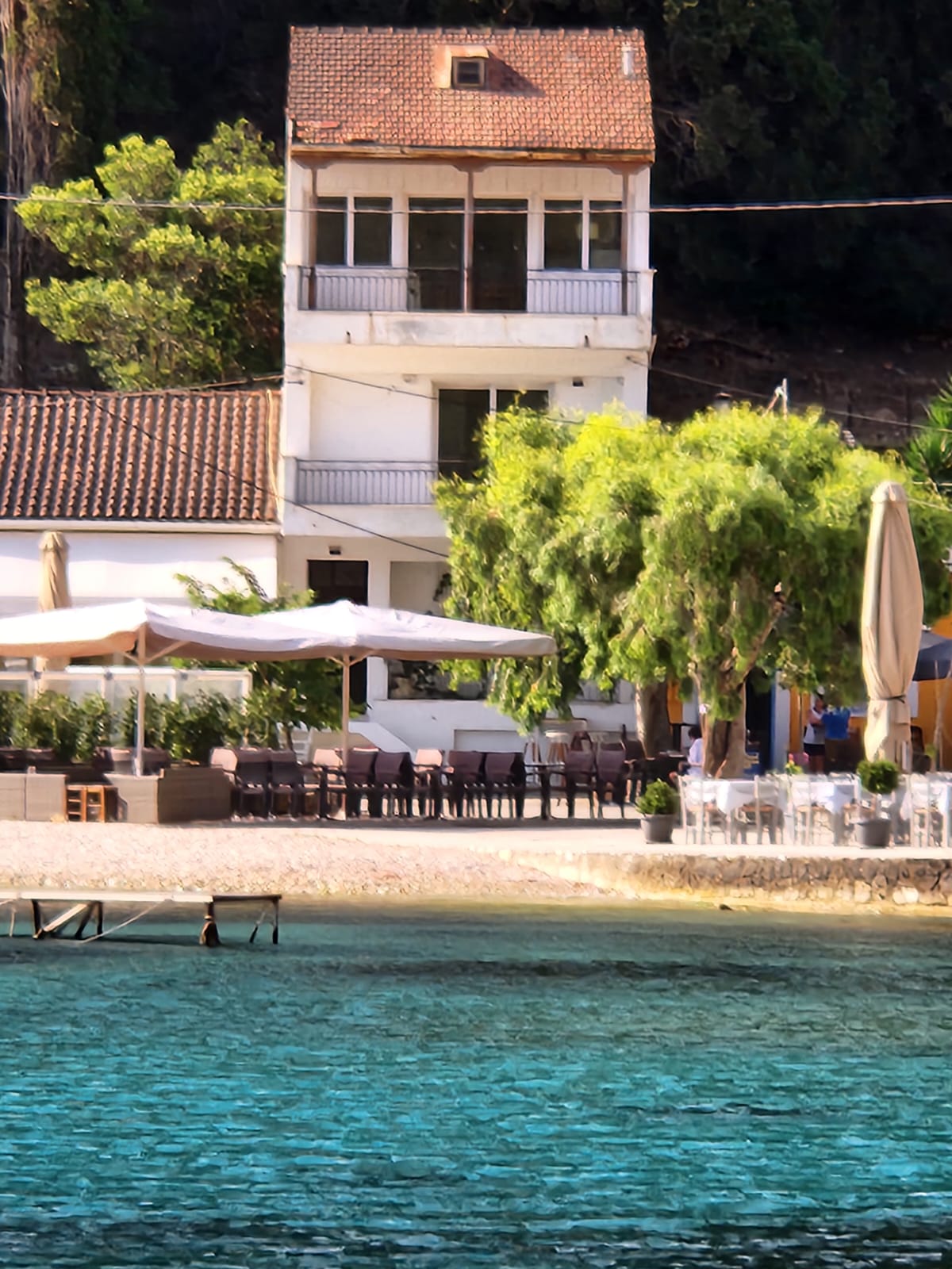 View from sea of house for sale in Ithaca Greece Frikes