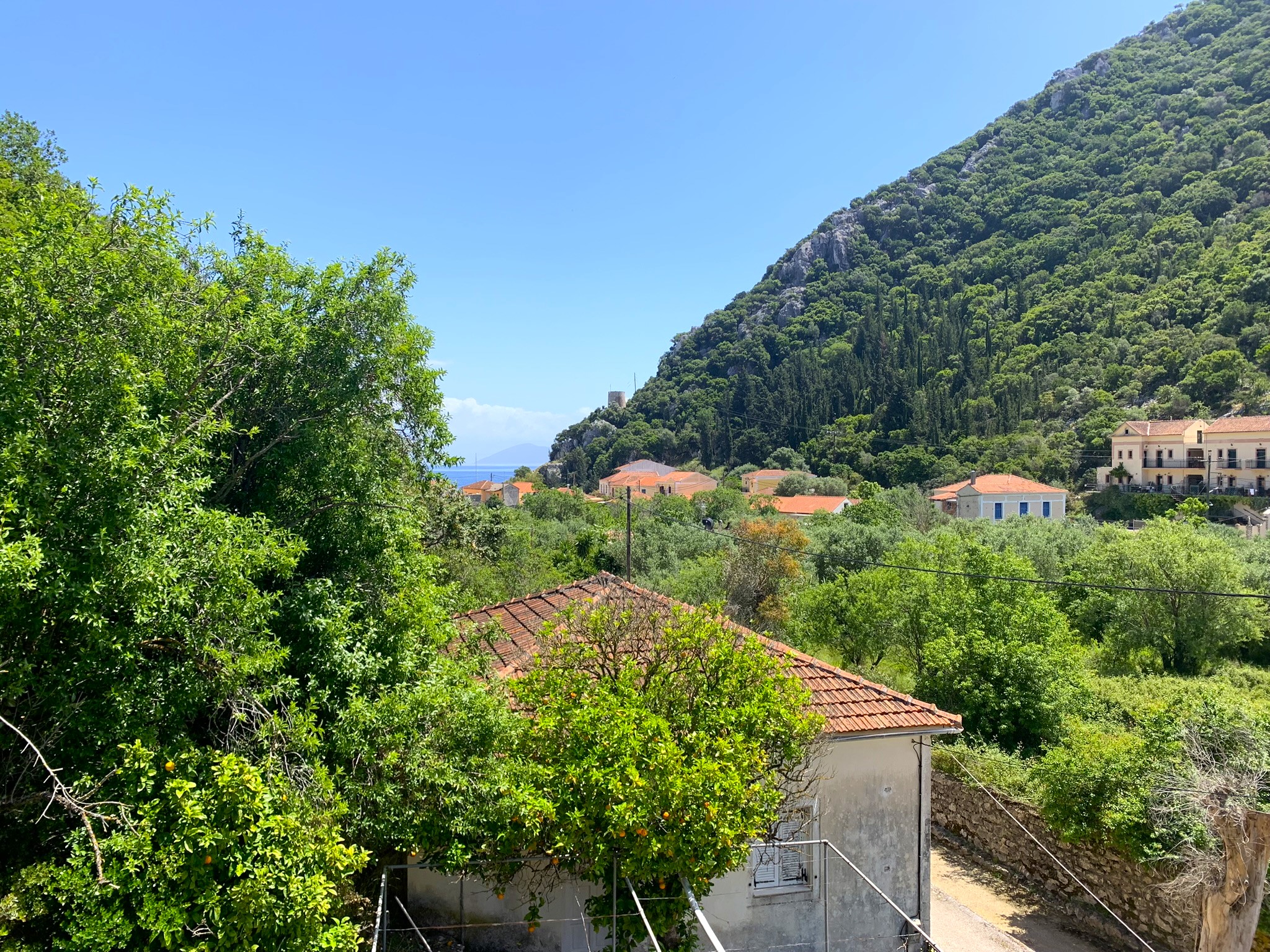 Outdoor spaces and views of house for sale on Ithaca Greece, Frikes