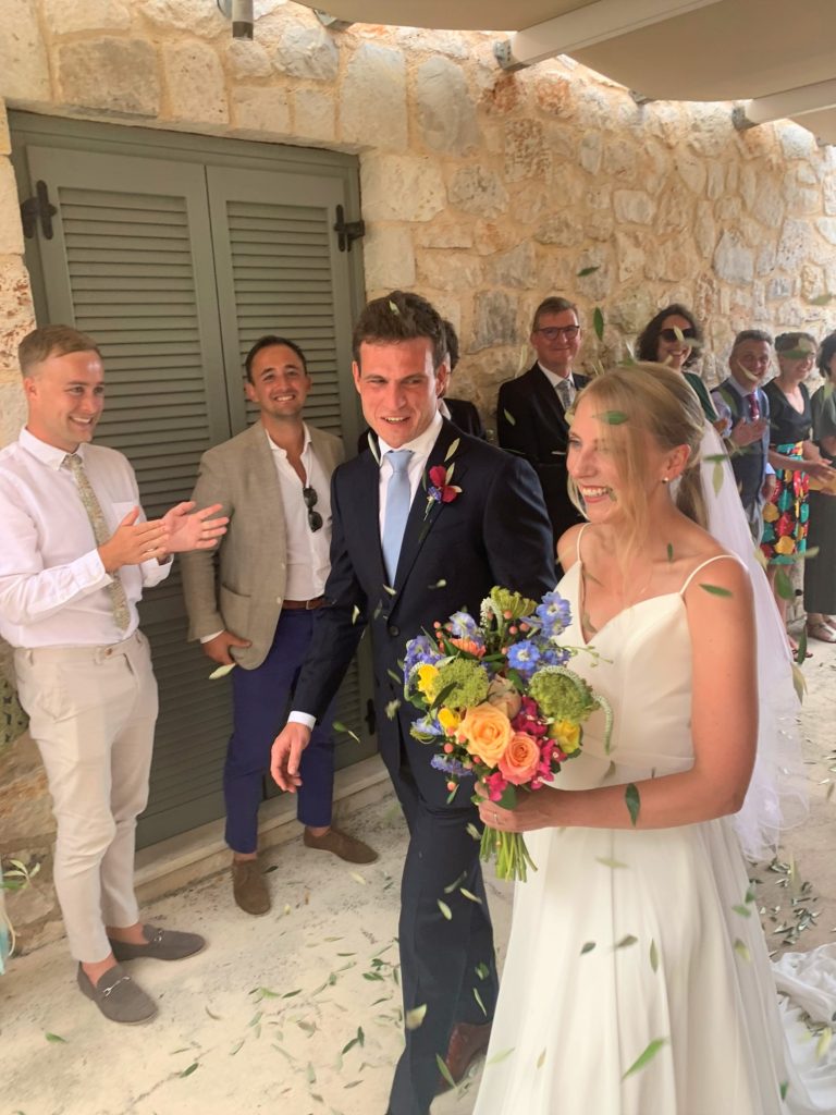 Bride and groom at wedding ceremony on Ithaca Greece