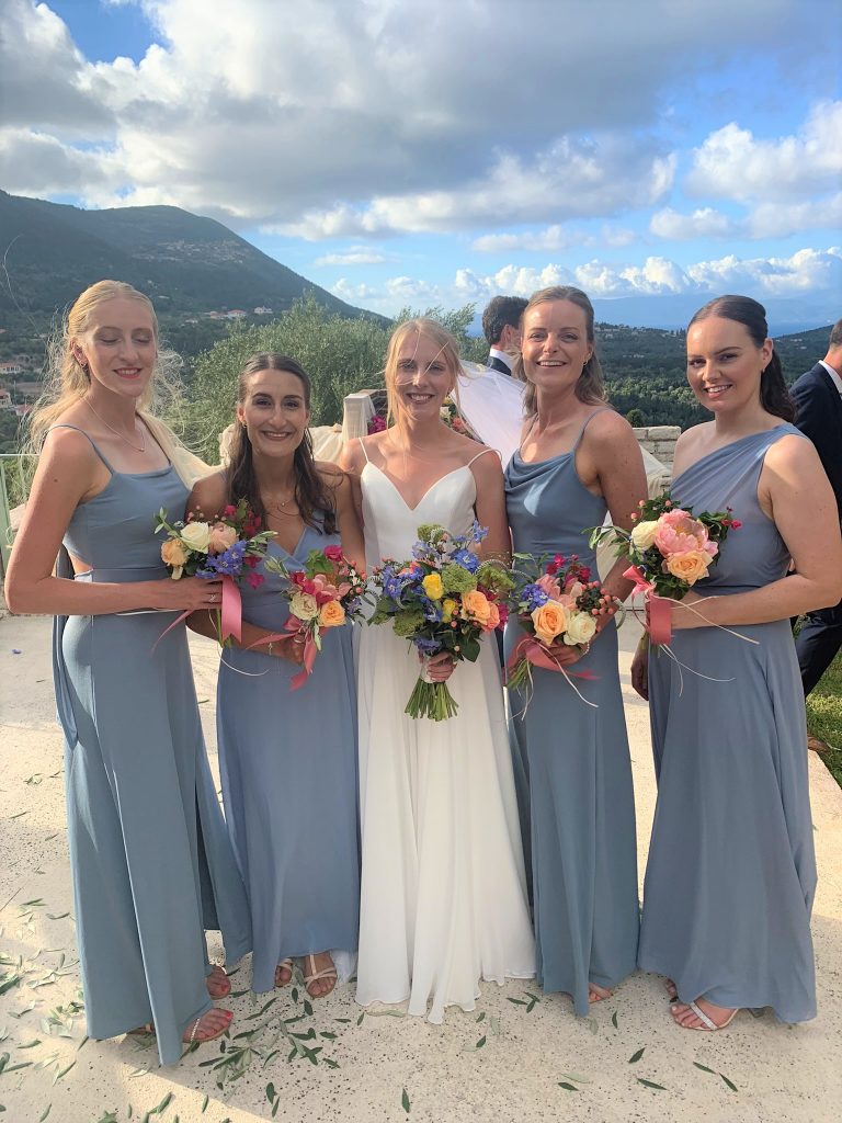 Bride with bridesmaids at wedding ceremony on Ithaca Greece