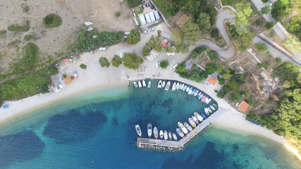 Drone pic, arrangements for wedding reception on seafront, Ithaca Greece