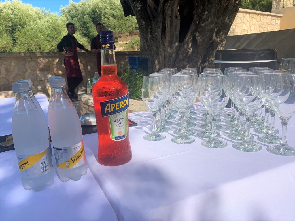 Welcome drinks at the open bar of wedding ceremony on Ithaca Greece