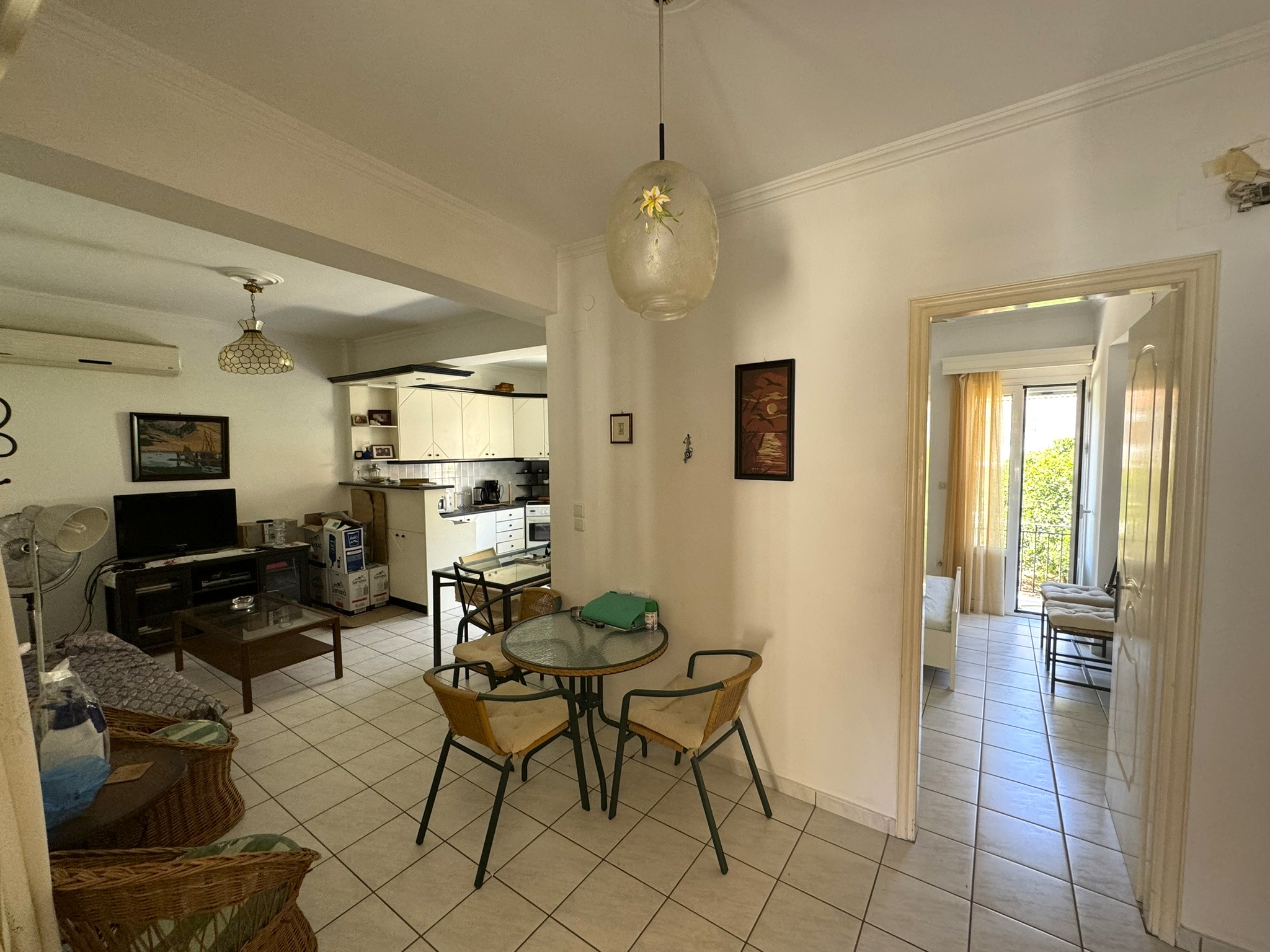 Kitchen and lounge of house for sale in Ithaca Greece Vathi