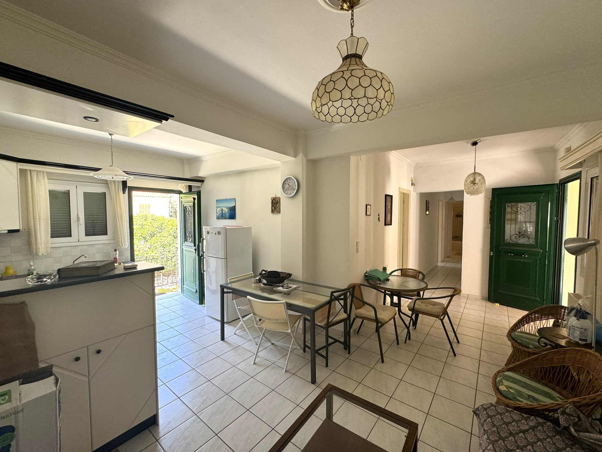 Kitchen and lounge of house for sale in Ithaca Greece Vathi