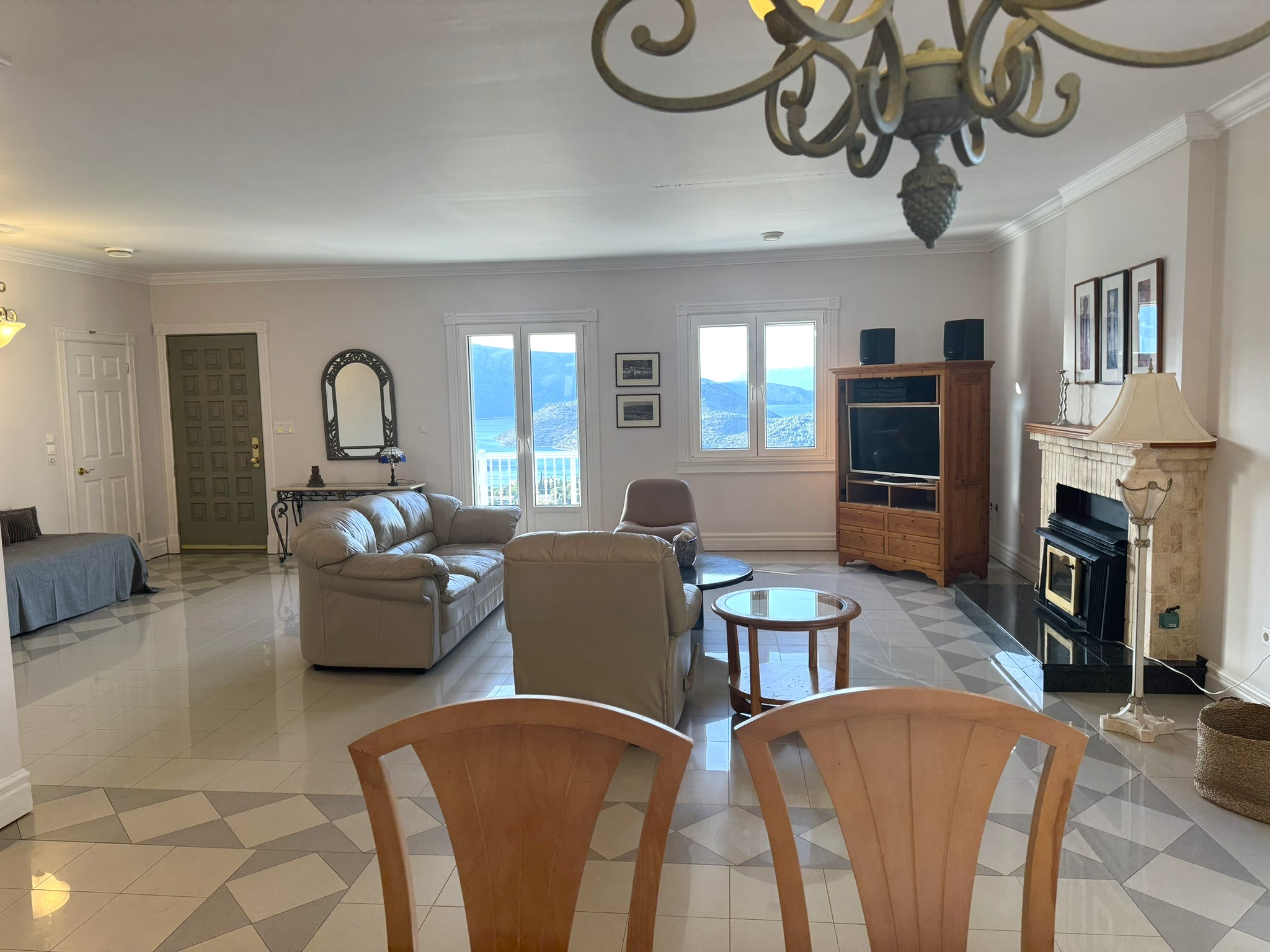 Dining and lounge area of villa with pool for rent in Ithaca Greece Perachori