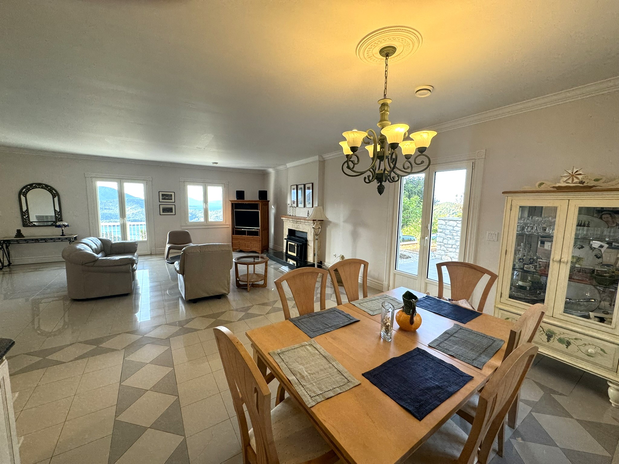 Dining and lounge area of villa with pool for rent in Ithaca Greece Perachori