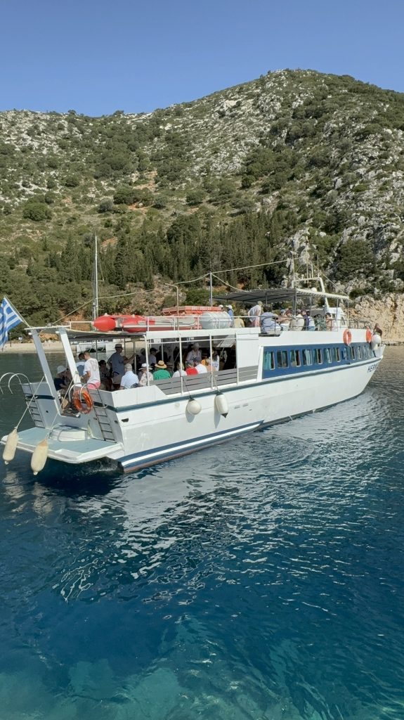 Boat day cruise around the island of Ithaca Greece, Frikes
