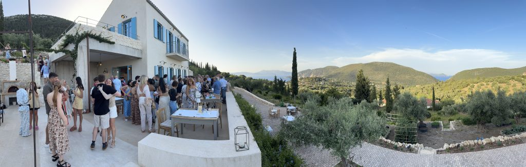 Panoramic pic of dinner venue of pre-wedding dinner party in Ithaca Greece Stavros
