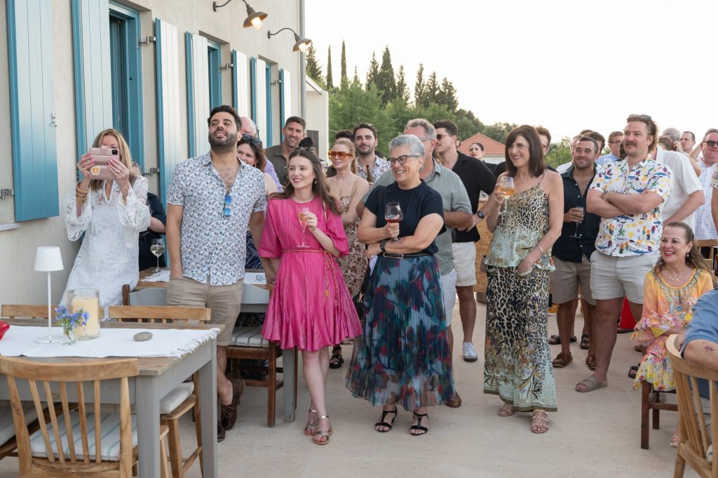 Guests at pre-wedding dinner party in Ithaca Greece, Stavros