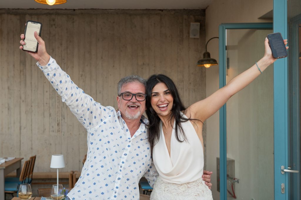 Bride and her father at pre-wedding dinner party in Ithaca Greece, Stavros