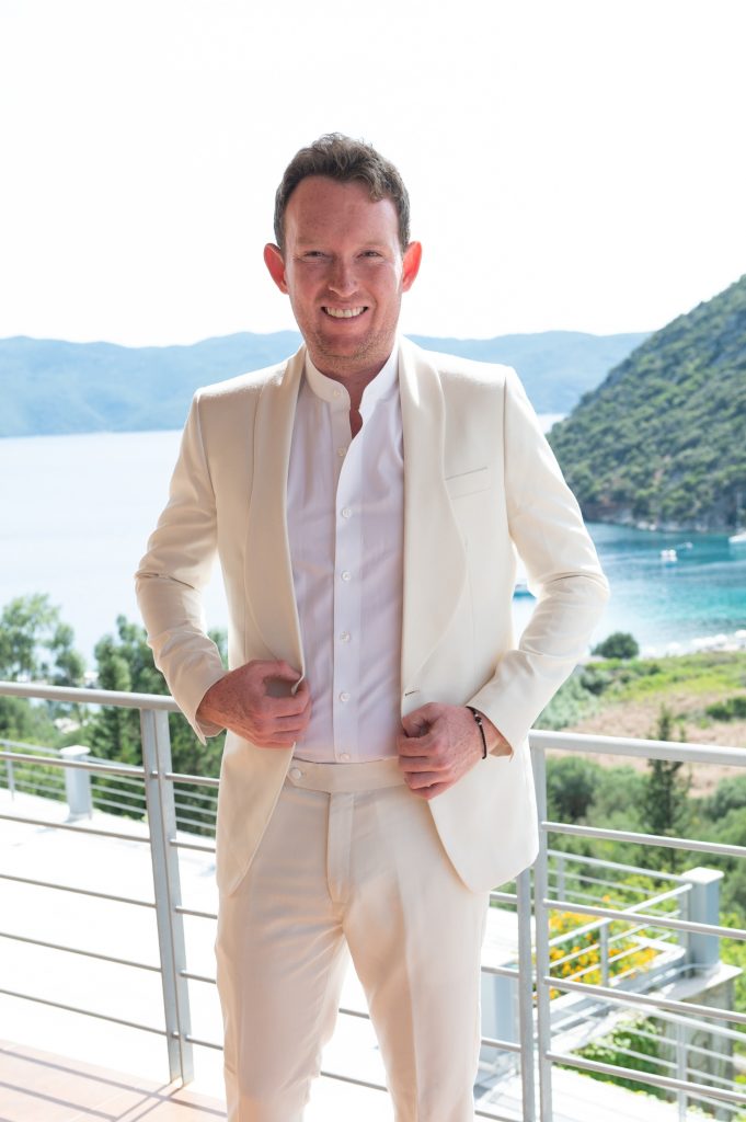 Groom getting ready for the wedding at villa in Ithaca Greece, Stavros