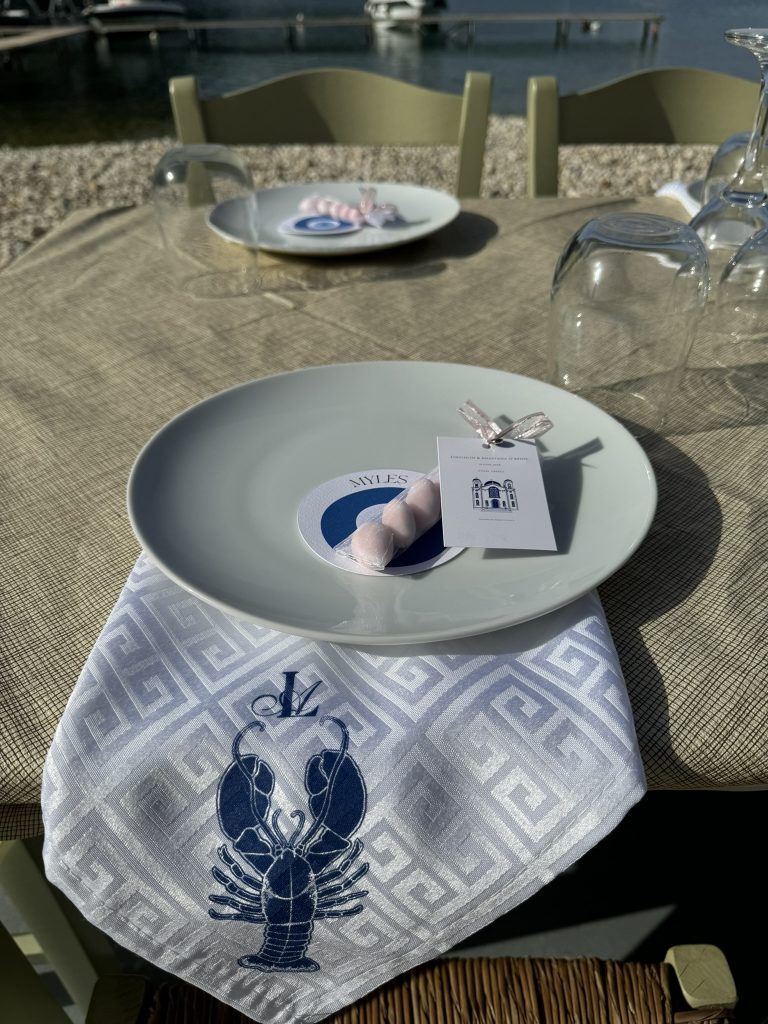 Plate detail on table at waterfront wedding reception in Ithaca Greece, Frikes