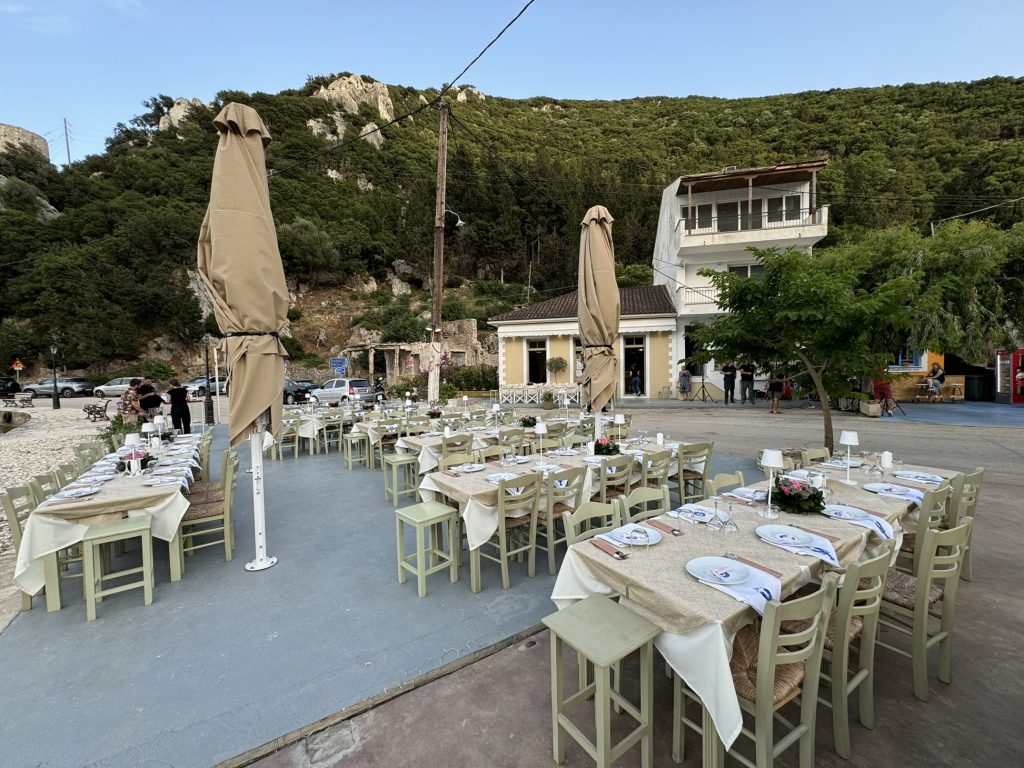 Wedding reception tables at beach restaurant in Ithaca Greece, Frikes