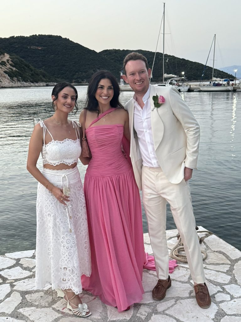 Newlywed couple at beach wedding reception in Ithaca Greece, Frikes