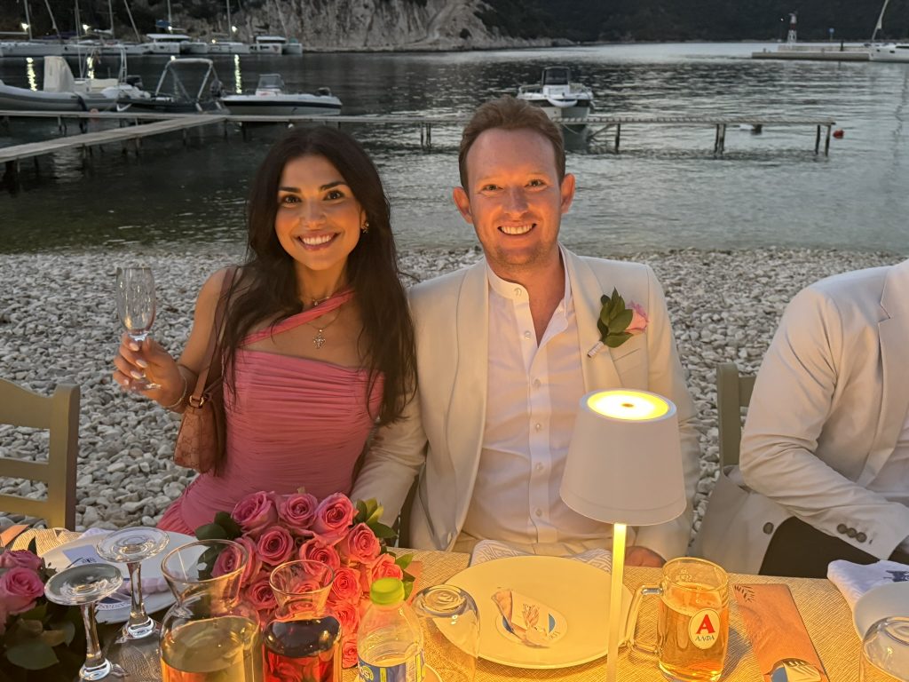 Newly wed couple at beach wedding reception in Ithaca Greece, Frikes