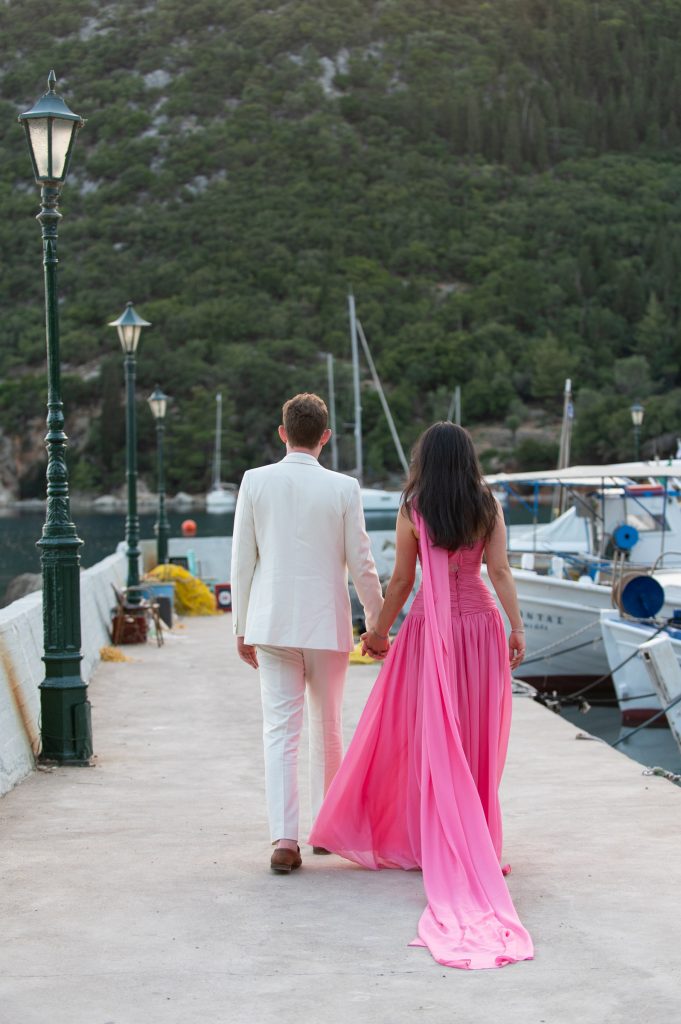 Newlywed couple at waterfront wedding reception in Ithaca Greece, Frikes