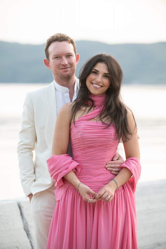 Newlywed couple at waterfront wedding reception in Ithaca Greece, Frikes