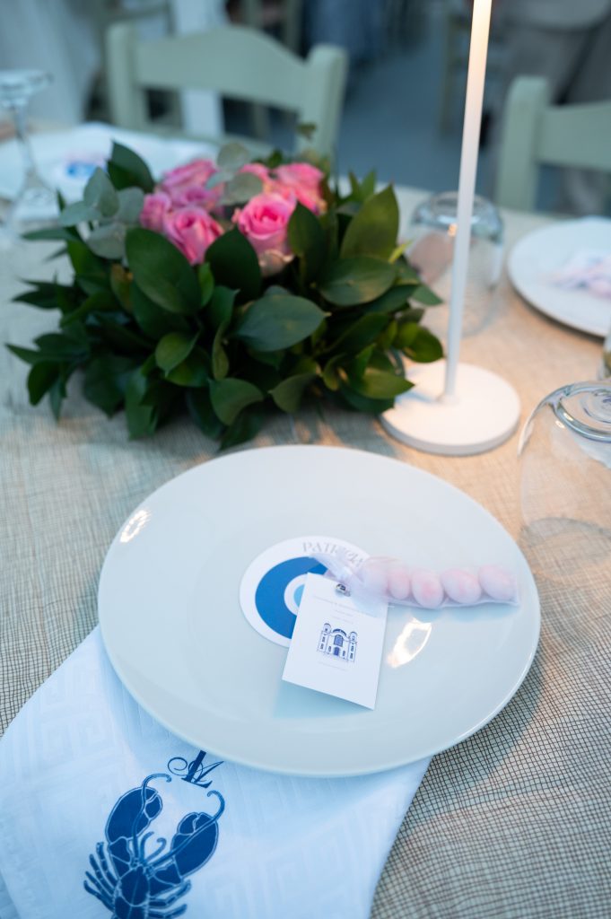 Wedding favors on plates at wedding reception in Ithaca Greece, Frikes
