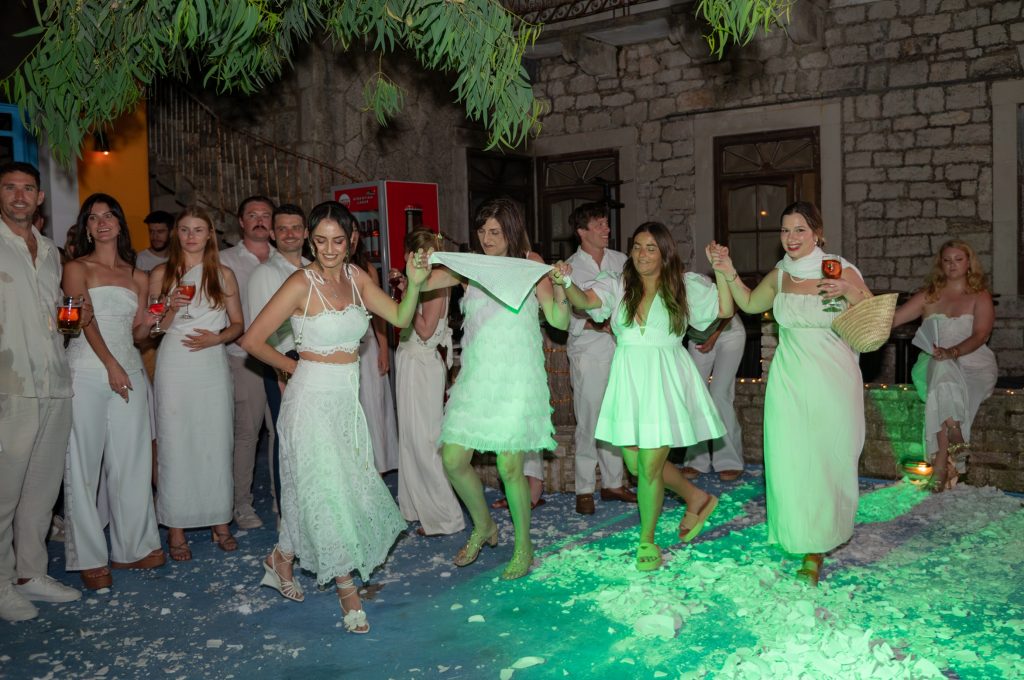 Greek dances and smashing the plates at wedding reception in Ithaca Greece, Frikes
