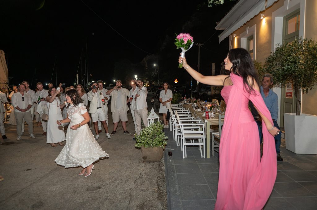 Bouquet toss at wedding planned in Ithaca Greece, Frikes