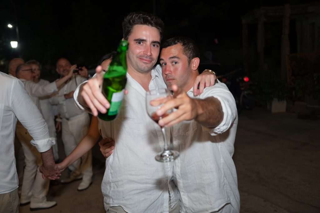 Guests at wedding party in Ithaca Greece, Frikes