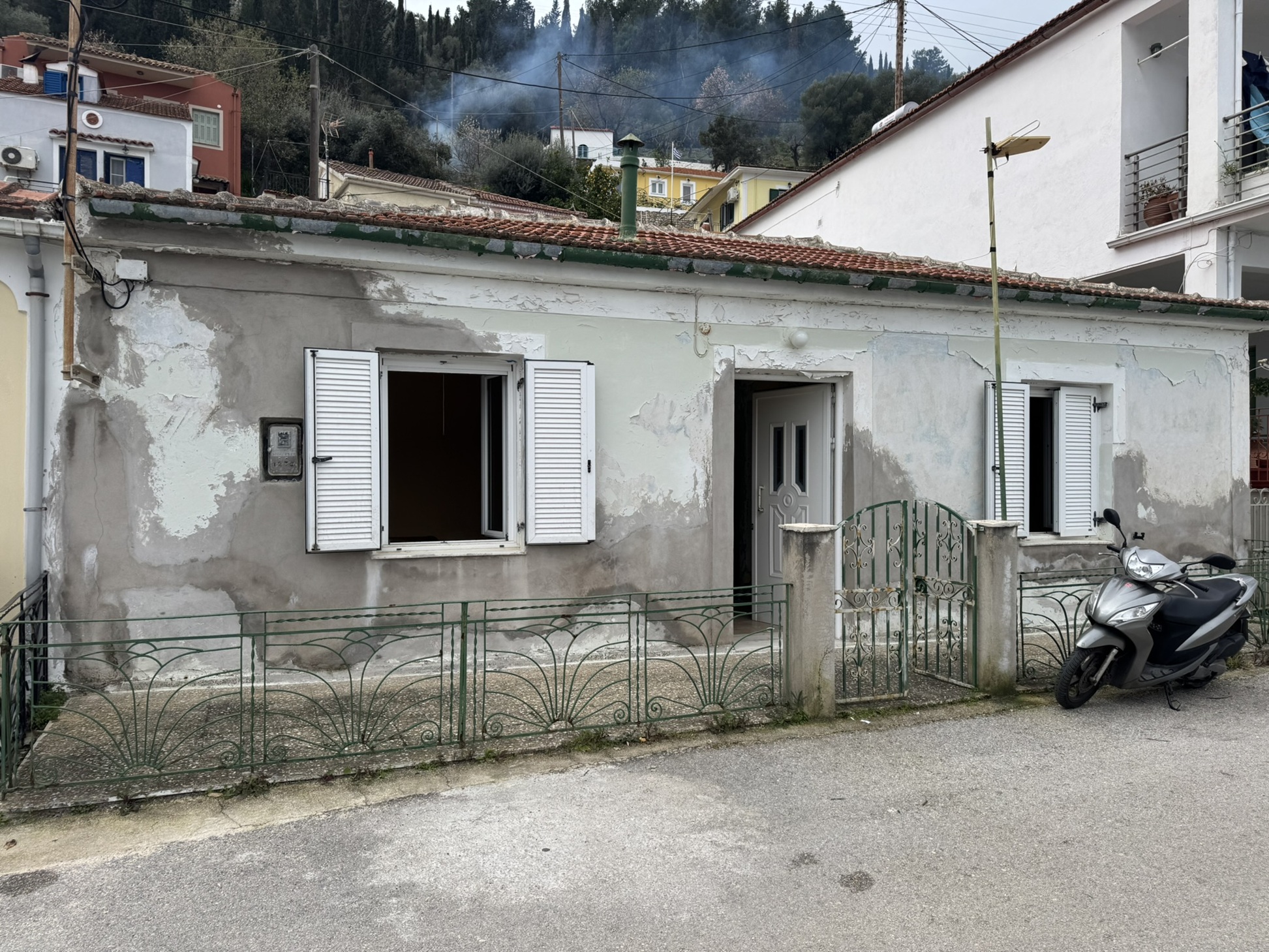 Facade of waterfront house of house for sale in Ithaca Greece, Vathi