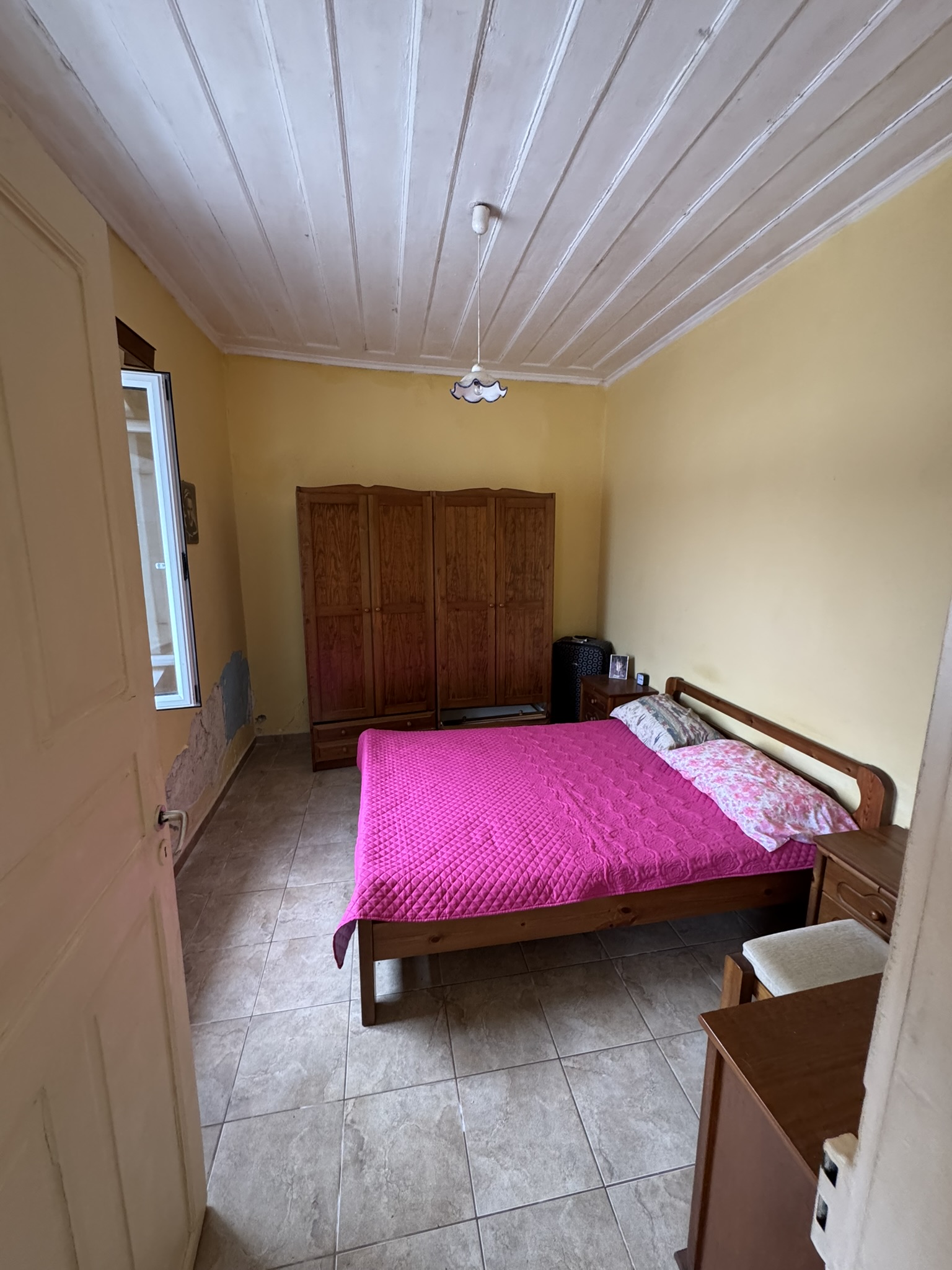 Bedroom of waterfront house for sale in Ithaca Greece, Vathi