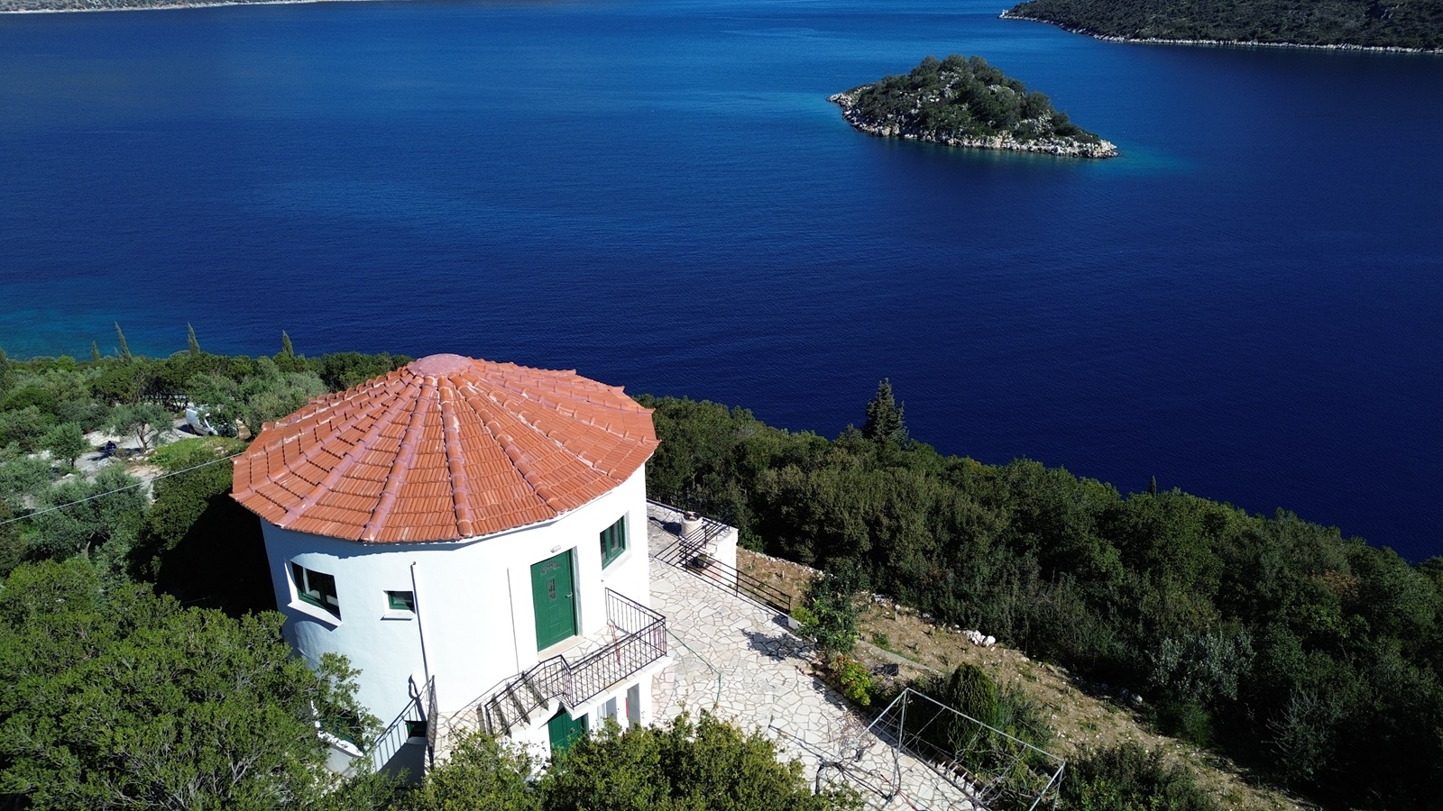Aerial view of windmill house for sale in Ithaca Greece, Vathi