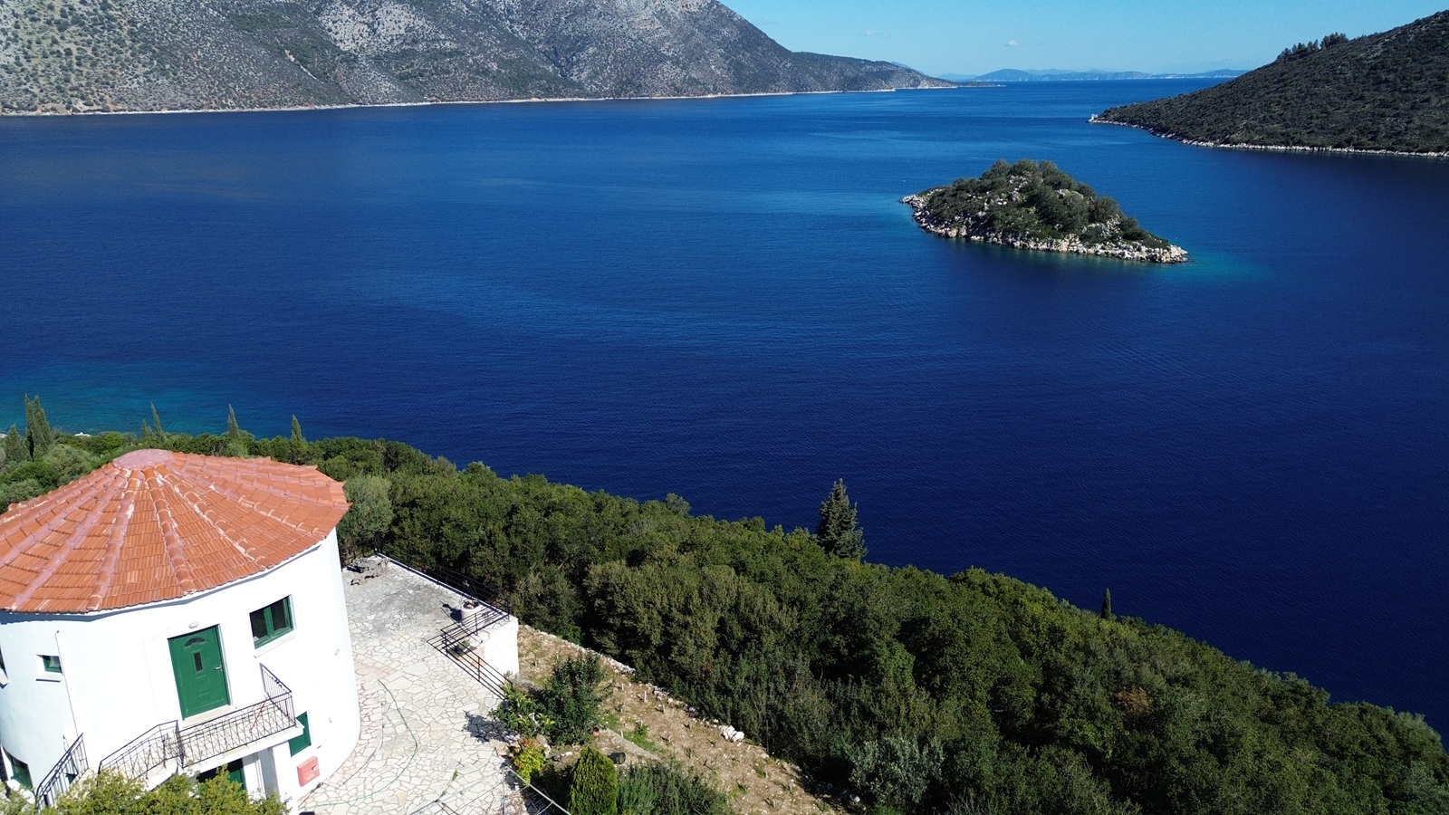 Aerial view of windmill house for sale in Ithaca Greece, Vathi