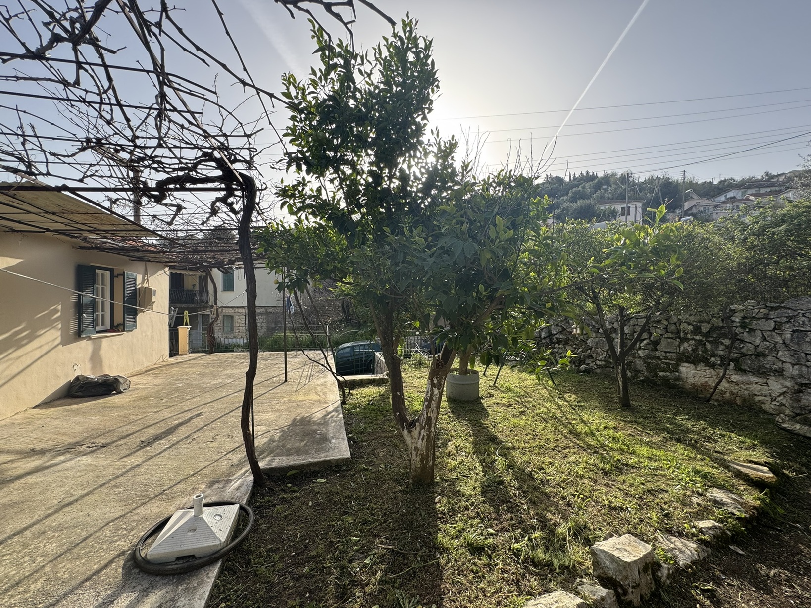 Garden and patio of house for sale in Ithaca Greece, Perachori