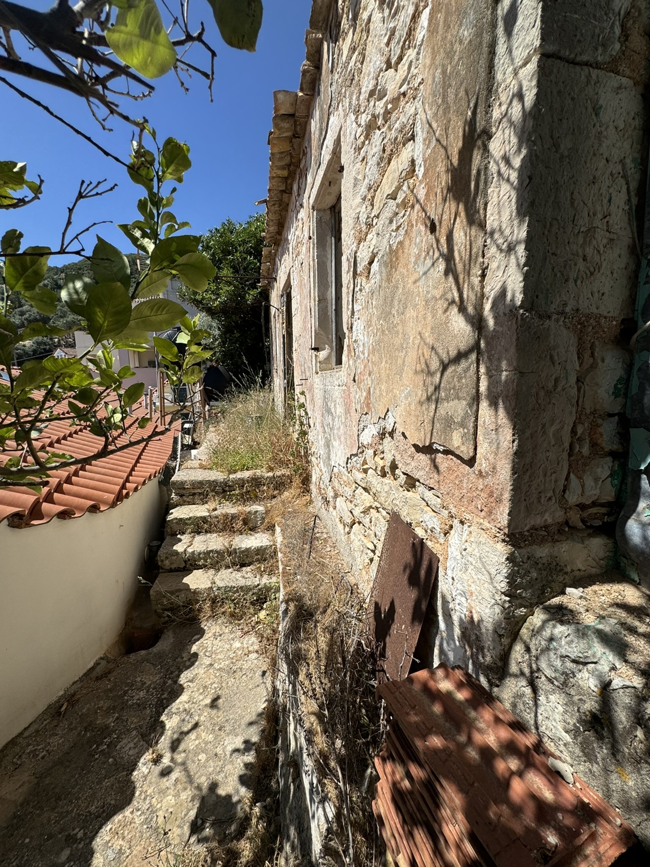 Access footpath and exterior of ruin for sale in Ithaca Greece, Vathi