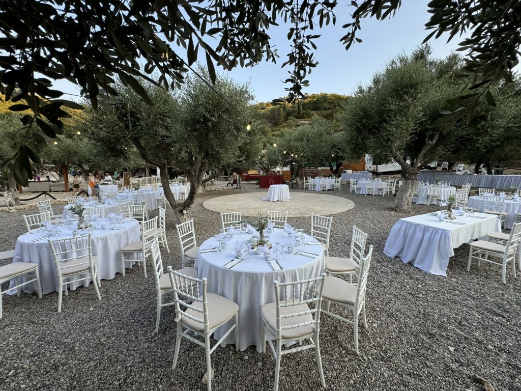 Table setting at beach wedding reception in Ithaca Greece, Vathi