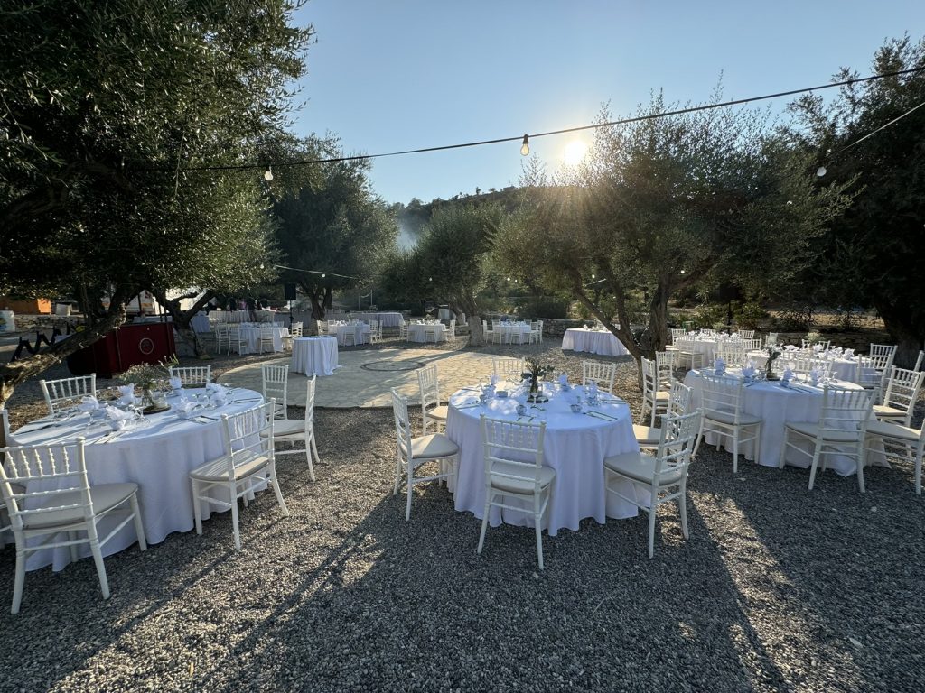 Table setting at beach wedding reception in Ithaca Greece, Vathi
