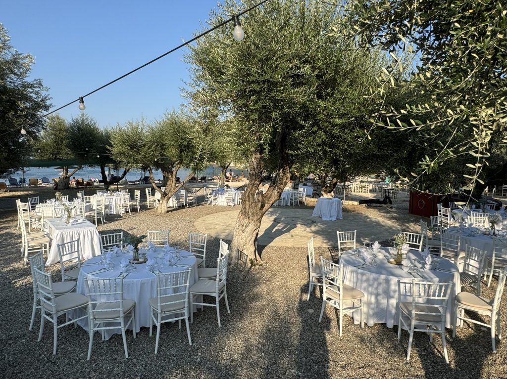 Table setting at beach wedding reception in Ithaca Greece, Vathi