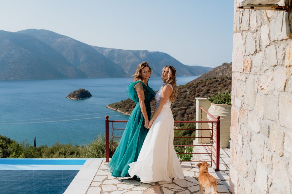 Bride getting dressed for wedding in Ithaca Greece, Vathi