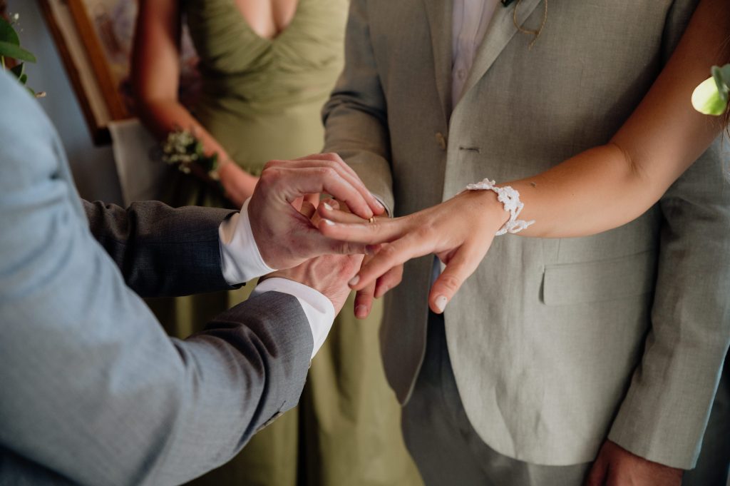 Rings exchange at wedding ceremony in Ithaca Greece, Vathi
