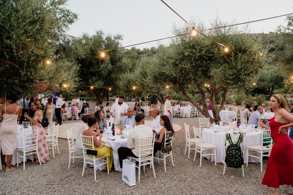 Table setting at beach wedding reception in Ithaca Greece, Vathi