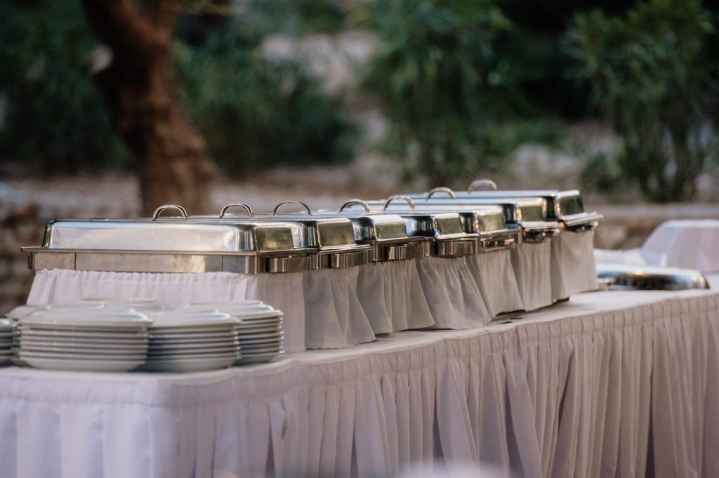 Catering table at beach wedding reception in Ithaca Greece, Vathi