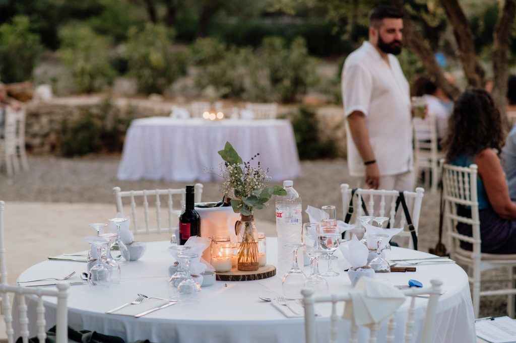 Table arrangement at beach wedding party in Ithaca Greece, Vathi