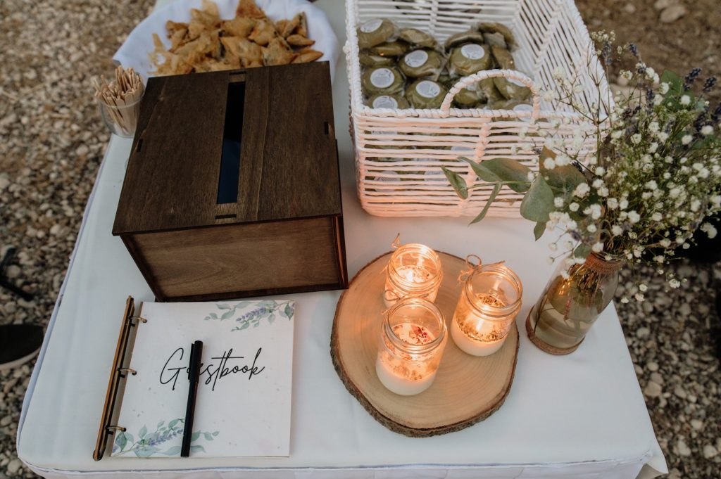 Guest book and gift box at beach party reception in Ithaca Greece, Vathi
