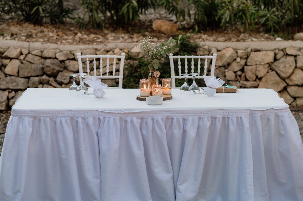 The couple's table at beach wedding reception in Ithaca Greece, Vathi